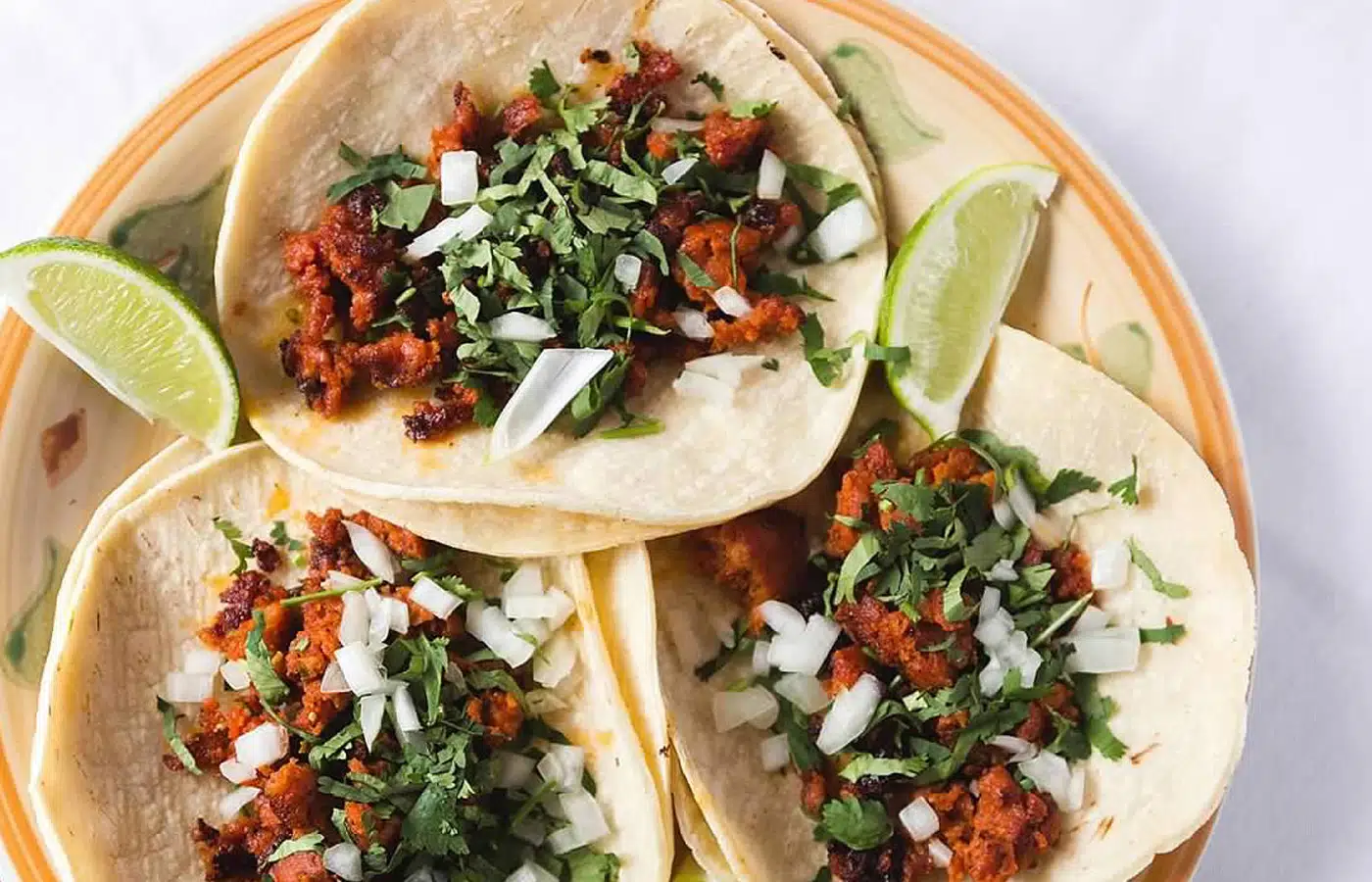 Tacos with cilantro, onions, and lime